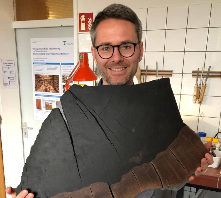 Frederic Lens with a piece of ebony